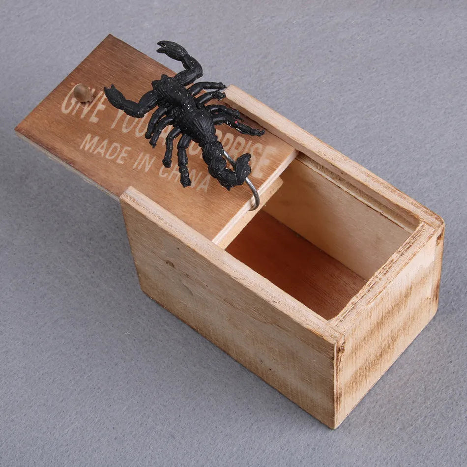 Wooden scare box prank toy with jumping animal surprise for April Fools gags