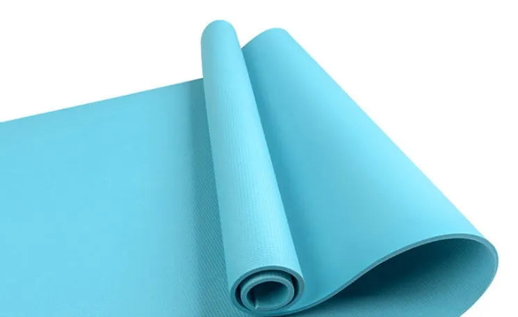 Red EVA fitness yoga mat showing thickness options of 4mm and 6mm on a wooden floor