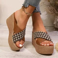 Cross leopard plaid wedge sandals in black or brown with rubber sole and plastic construction