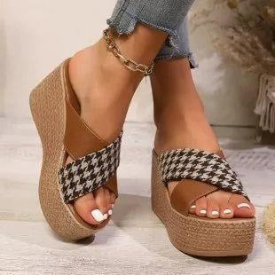 Cross leopard plaid wedge sandals in black or brown with rubber sole and plastic construction