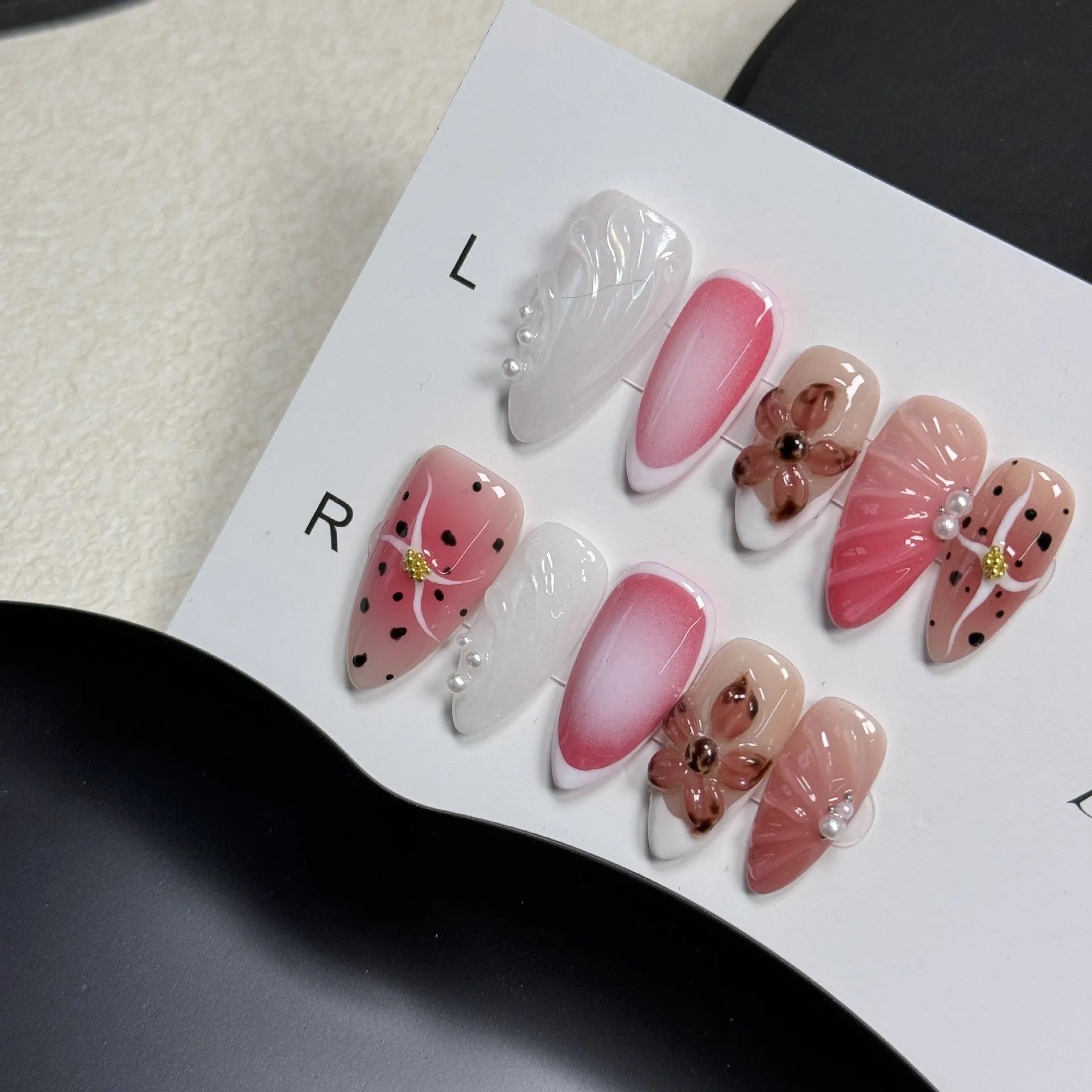 Hand-painted three-dimensional carved nail patches with embossed candy design in multiple colours