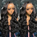 A woman wearing a black medium-length curly synthetic wig with full head coverage.