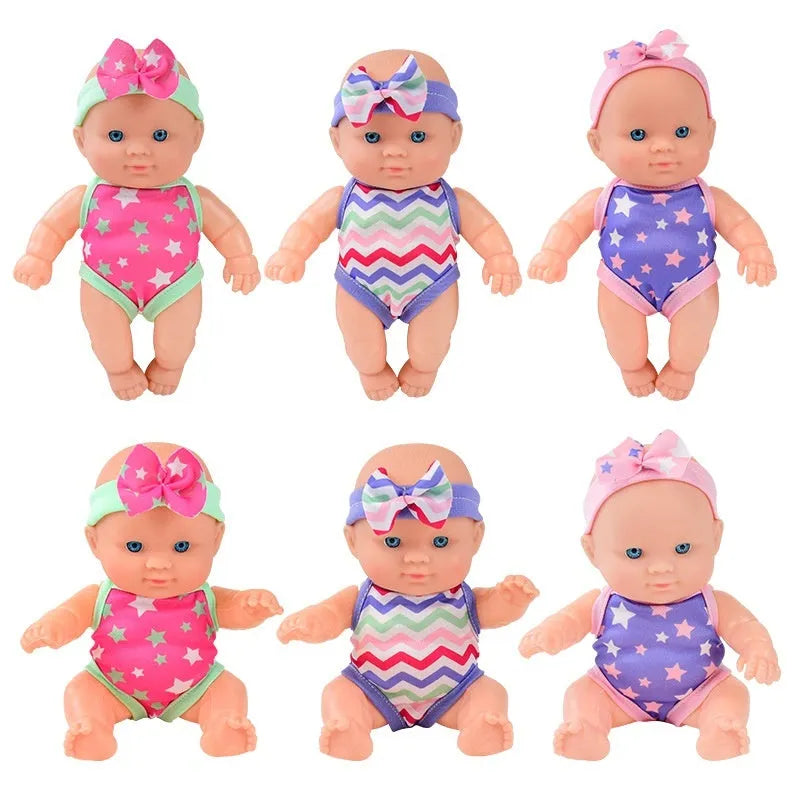 21.5cm tall simulation baby vinyl figurine doll in one of six colour variations on display