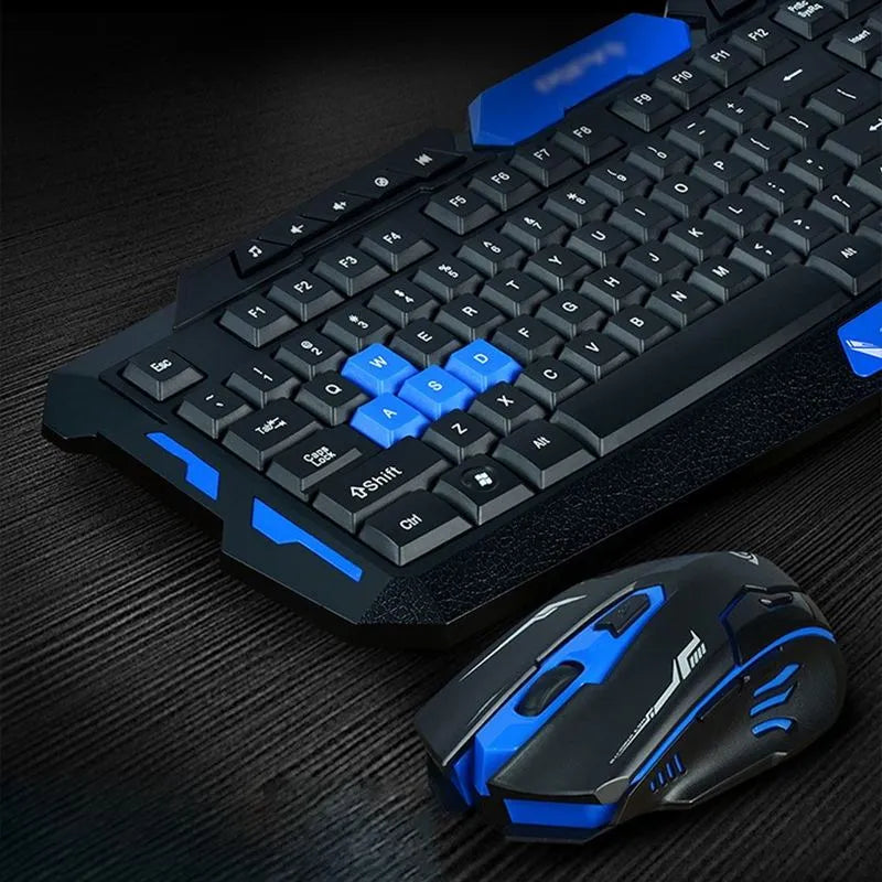 Black and blue wireless keyboard and mouse set on a desk