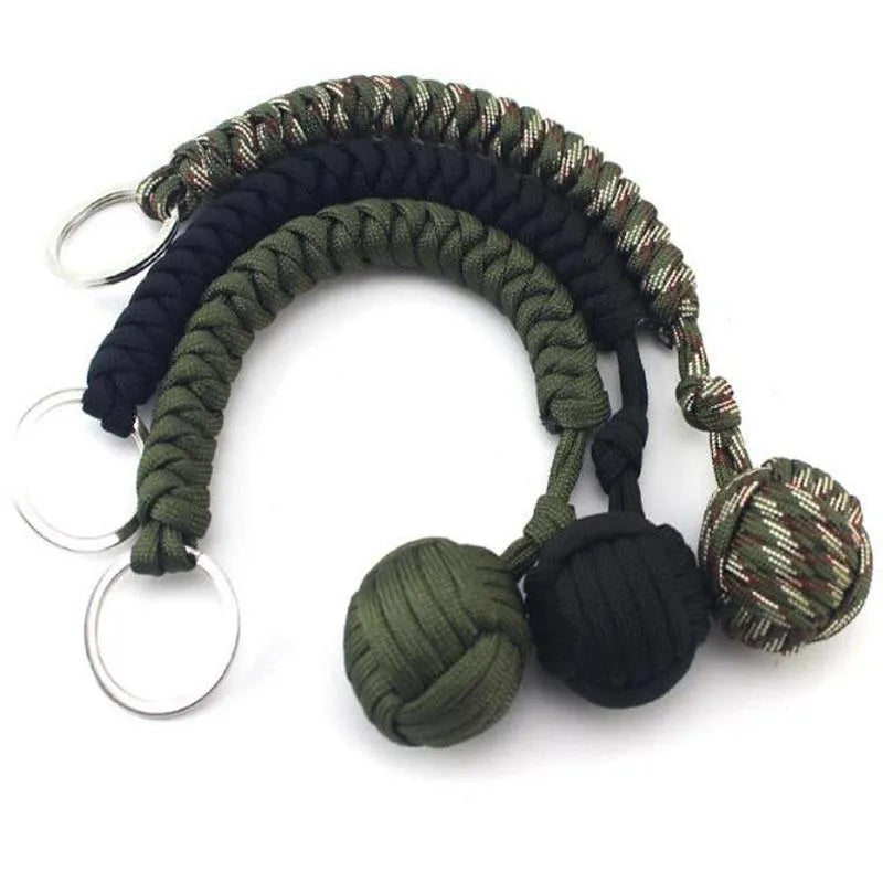 Seven-core umbrella rope climbing survival key chain with built-in round steel ball, 24cm length, black colour option