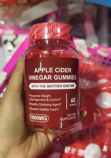 Bottle of apple cider vinegar gummy tablets containing 60 chewable soft candies for adult dietary supplementation