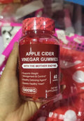 Bottle of apple cider vinegar gummy tablets containing 60 chewable soft candies for adult dietary supplementation