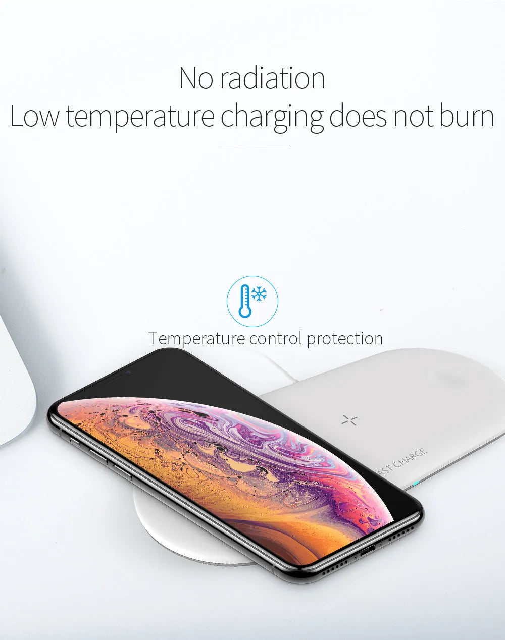 White three-in-one wireless charging station for Apple iPhone, watch, and headphones on a desk.