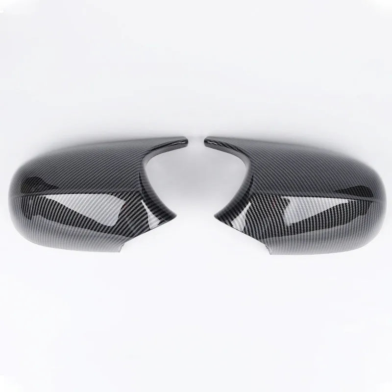 Pair of black ABS plastic rearview mirror housings for BMW 3 Series E90.