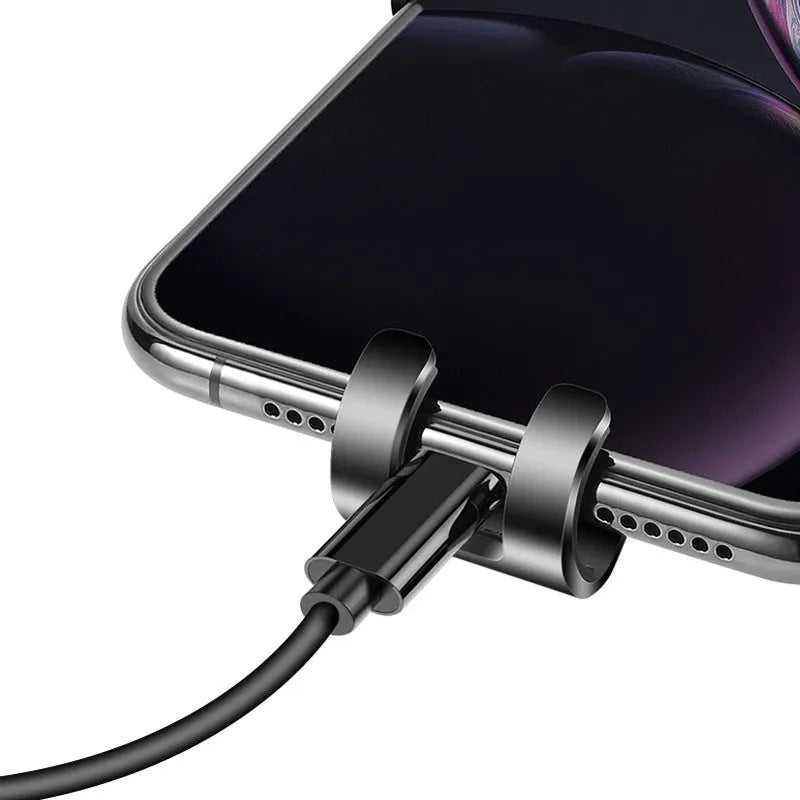 Black S4 gravity mirror car phone bracket mounted on air conditioning vent holding smartphone