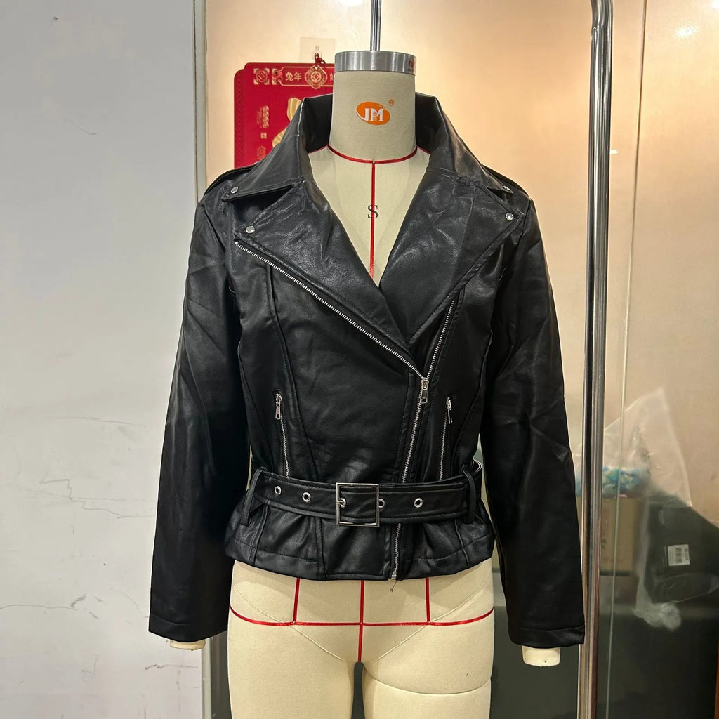 Women's black punk style jacket with a short belt lapel and Peter Pan collar.