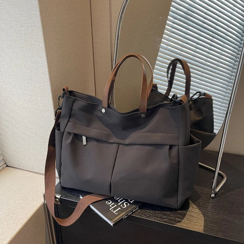 Nylon crossbody tote bag for women in black, grey, white, or green, showing 39x14x28 cm dimensions