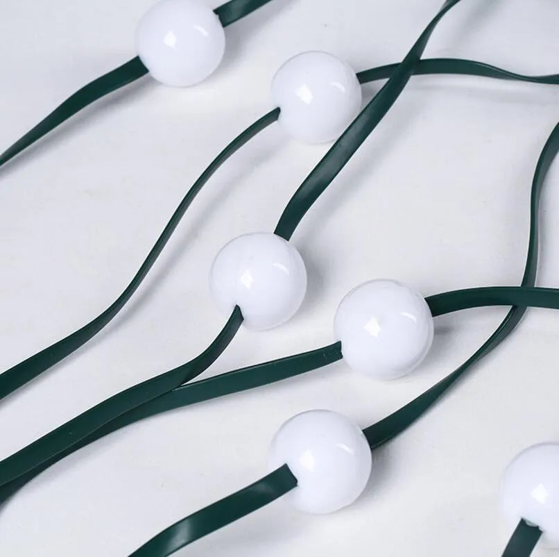 64 LED bead Christmas tree light string with button controller on a 1.8-metre cable.