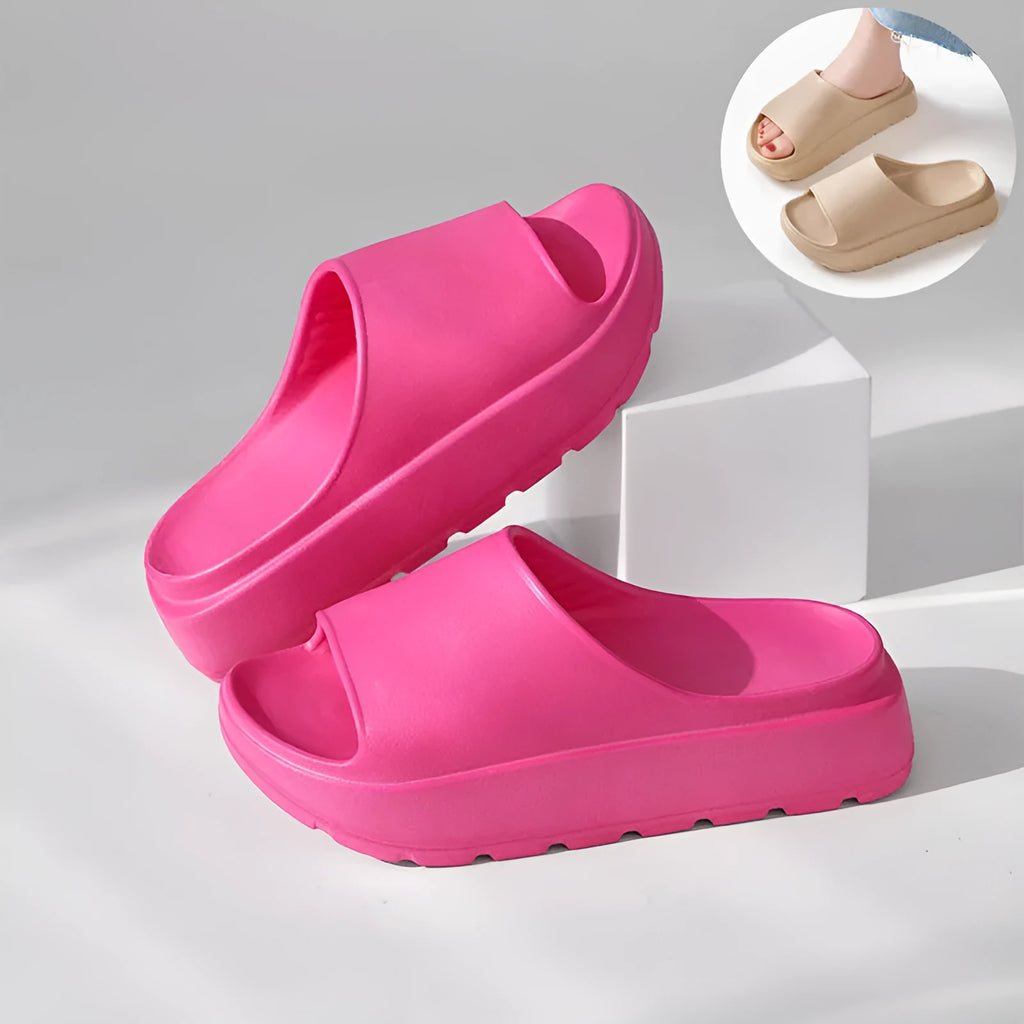 Women's thick-soled beige EVA beach slippers with a fish mouth design.