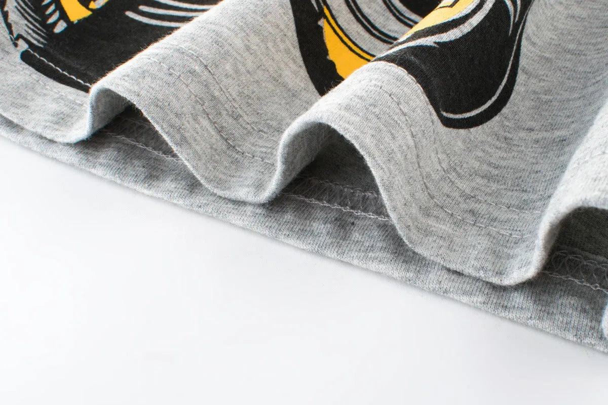 Children's light grey cartoon print cotton t-shirt with short sleeves and a round neck.