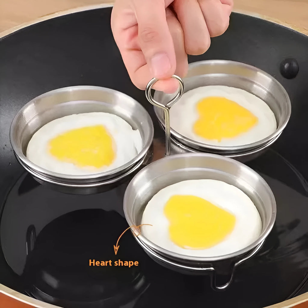 Stainless steel heart-shaped egg steamer with round mould option for compact breakfast preparation