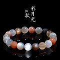 Natural colourful moonstone bracelet with a single 8mm bead on a cord.