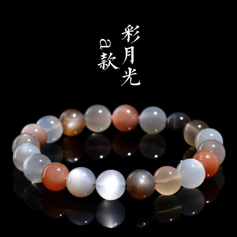Natural colourful moonstone bracelet with a single 8mm bead on a cord.
