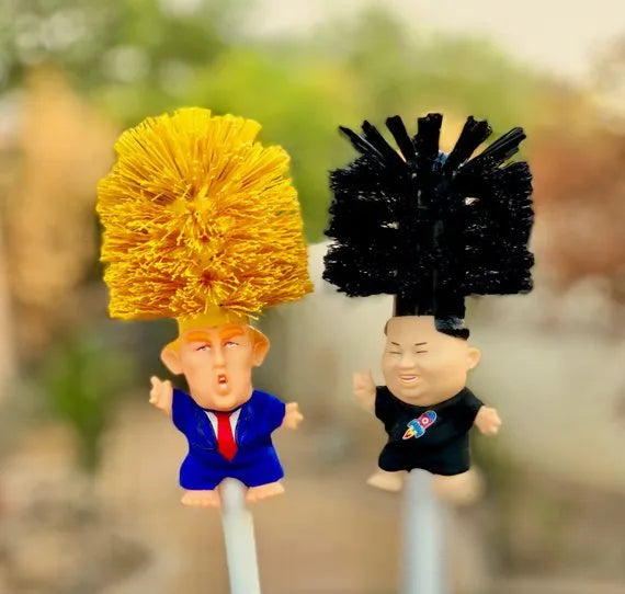 Yellow plastic Donald Trump novelty toilet brush with hanging handle, 40cm long