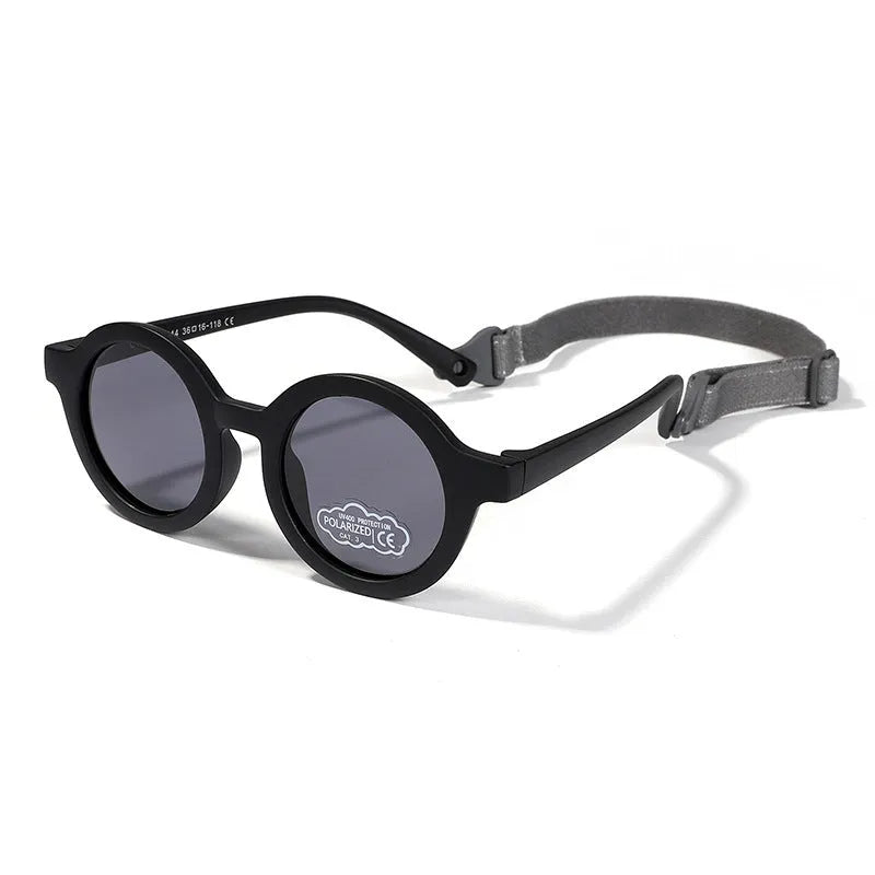 Children's silicone sunglasses with round full frame, UV400 polarised TAC lenses, and flexible TPEE construction for 0-3 year olds