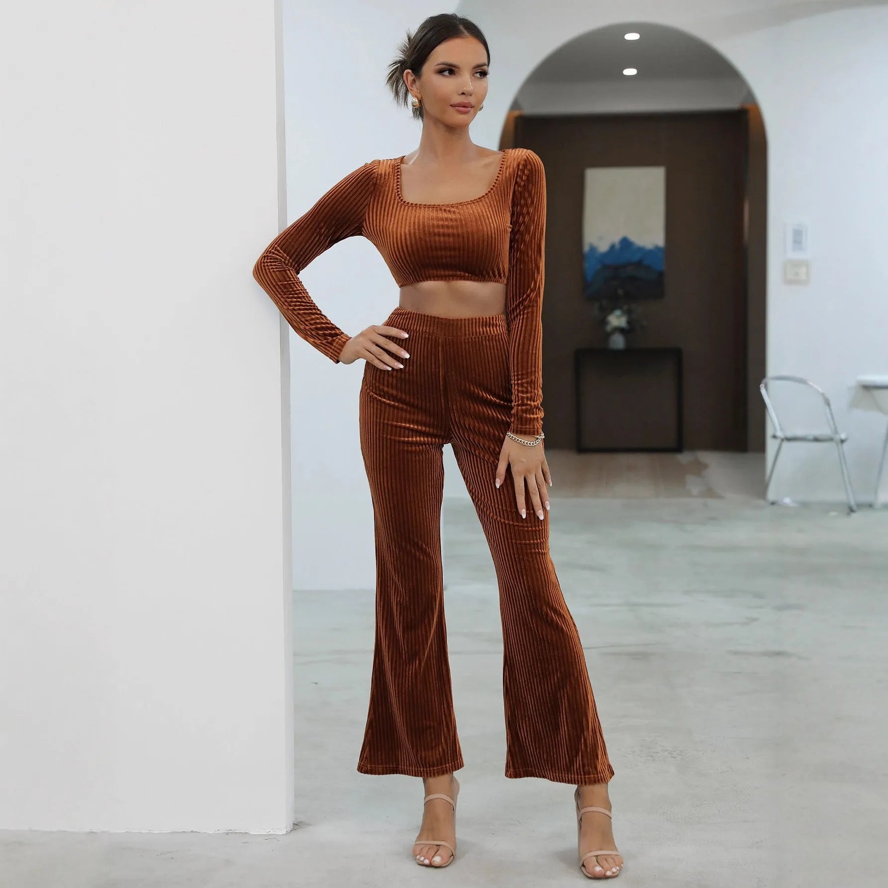 Caramel brown women's long sleeve sweater and matching lounge pants set on a hanger.