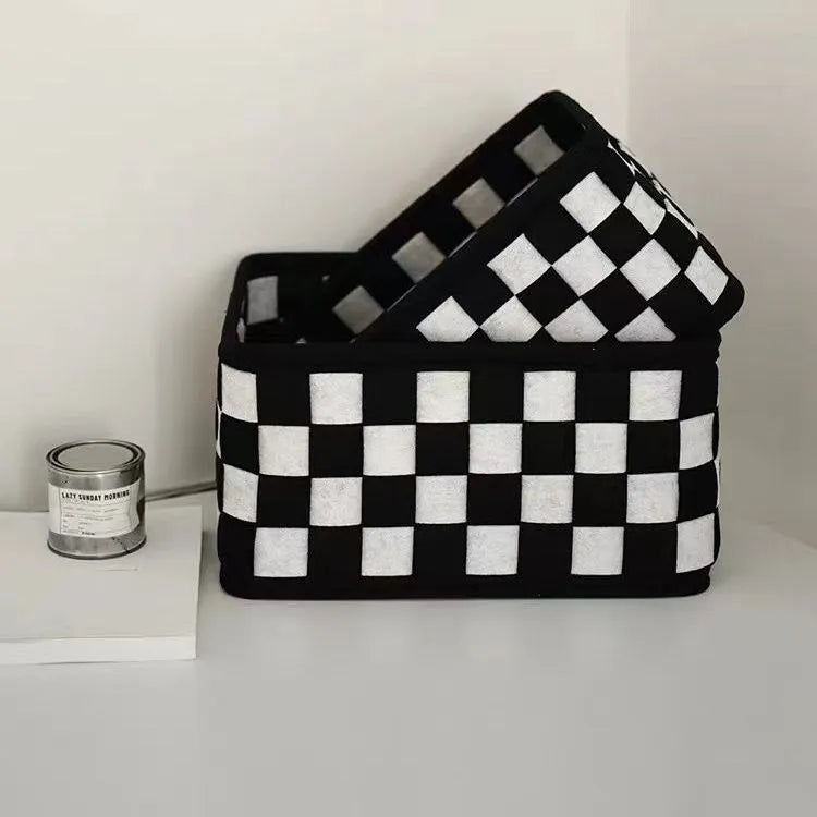 Checkerboard patterned woven felt folding storage basket with handle, showing dimensions 37cm by 29cm by 19.5cm.