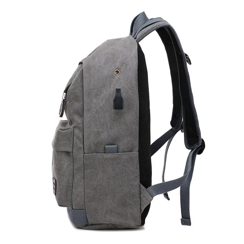 Canvas backpack with USB charging port showing coffee, grey, khaki, and black colour options