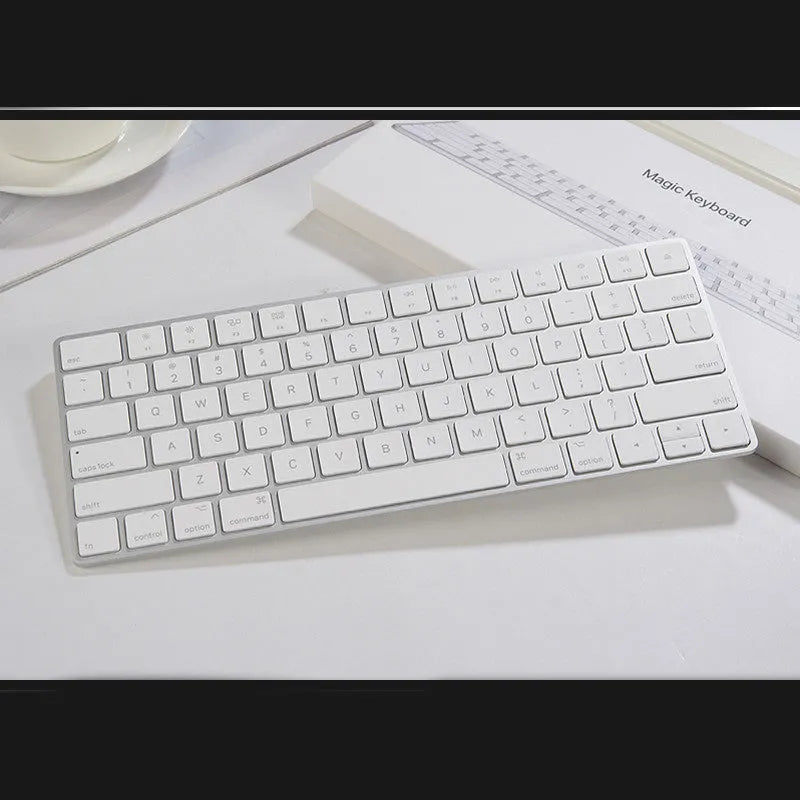 White Apple G6 Bluetooth wireless keyboard with ultra-thin metal casing.