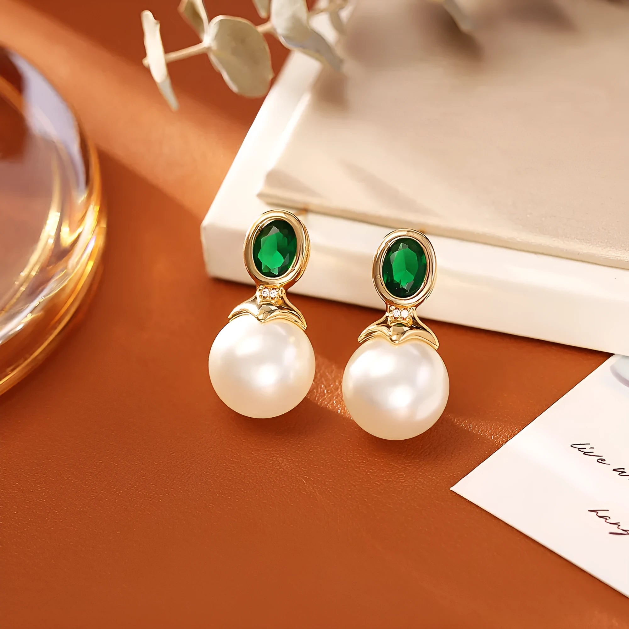 High-grade ruby pearl stud earrings with real gold plating in red colour on copper base