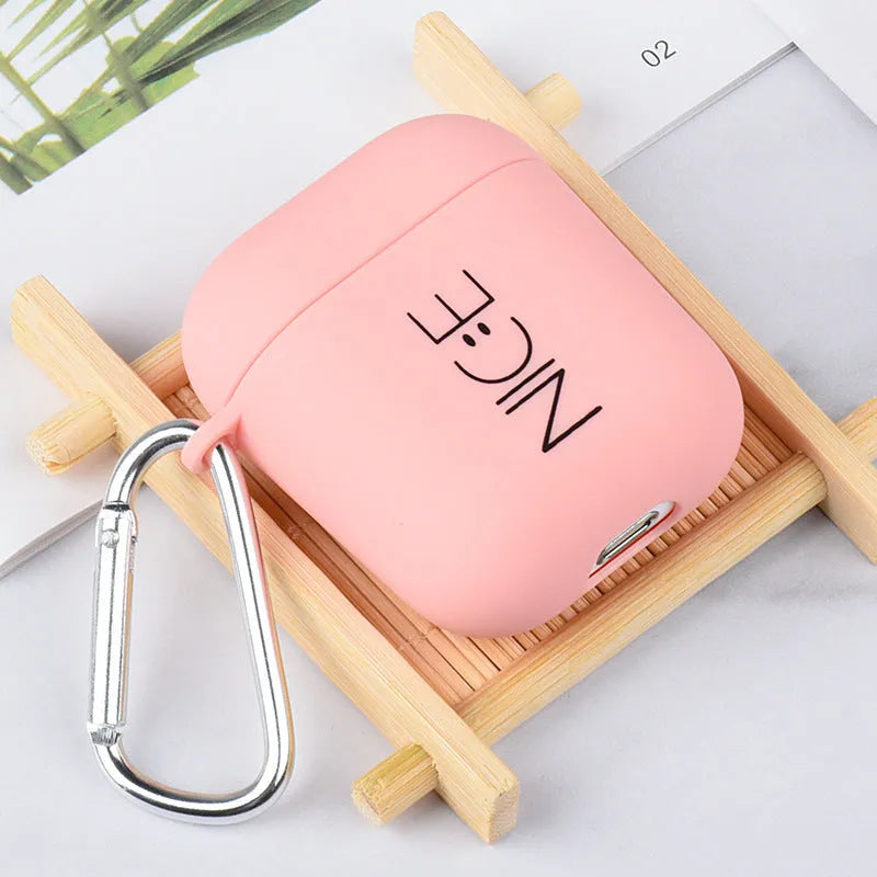 Black and Pink PC plastic protective case covers for AirPods with decorative Flower, Love, and Smiley face designs.