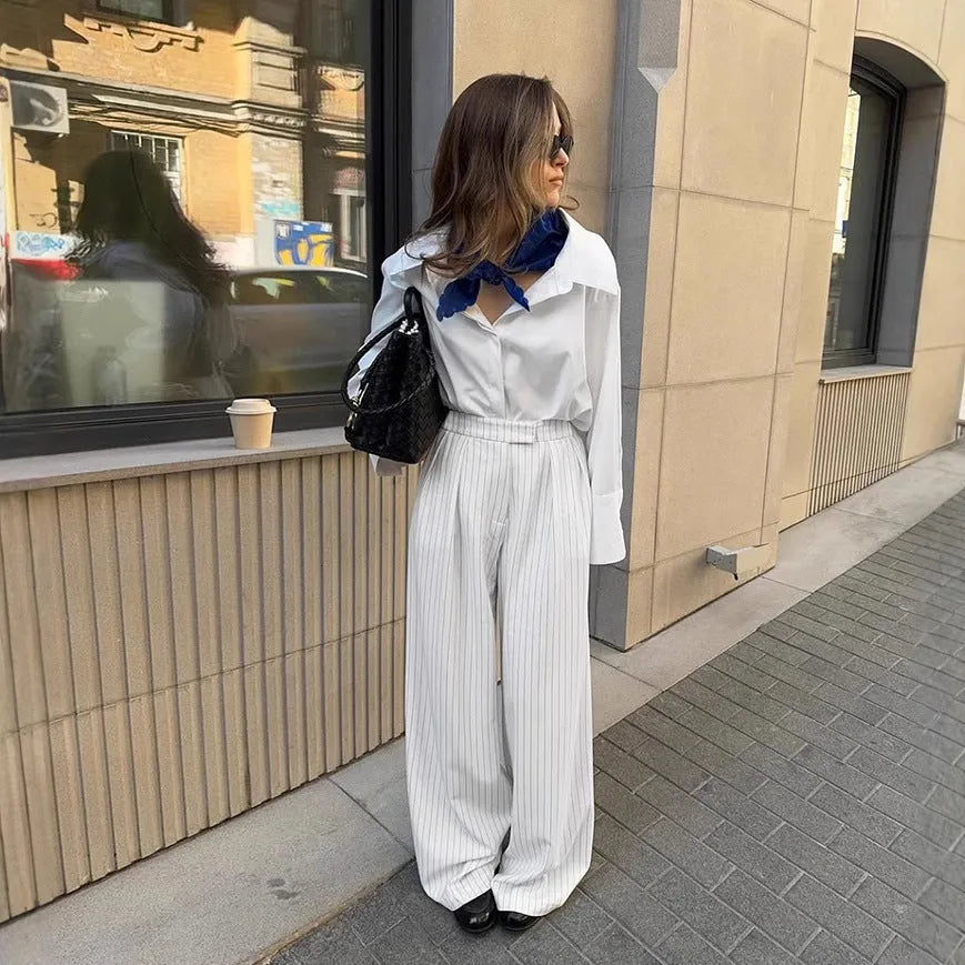 White striped wide-leg women's trousers with front zipper fastening for commuting
