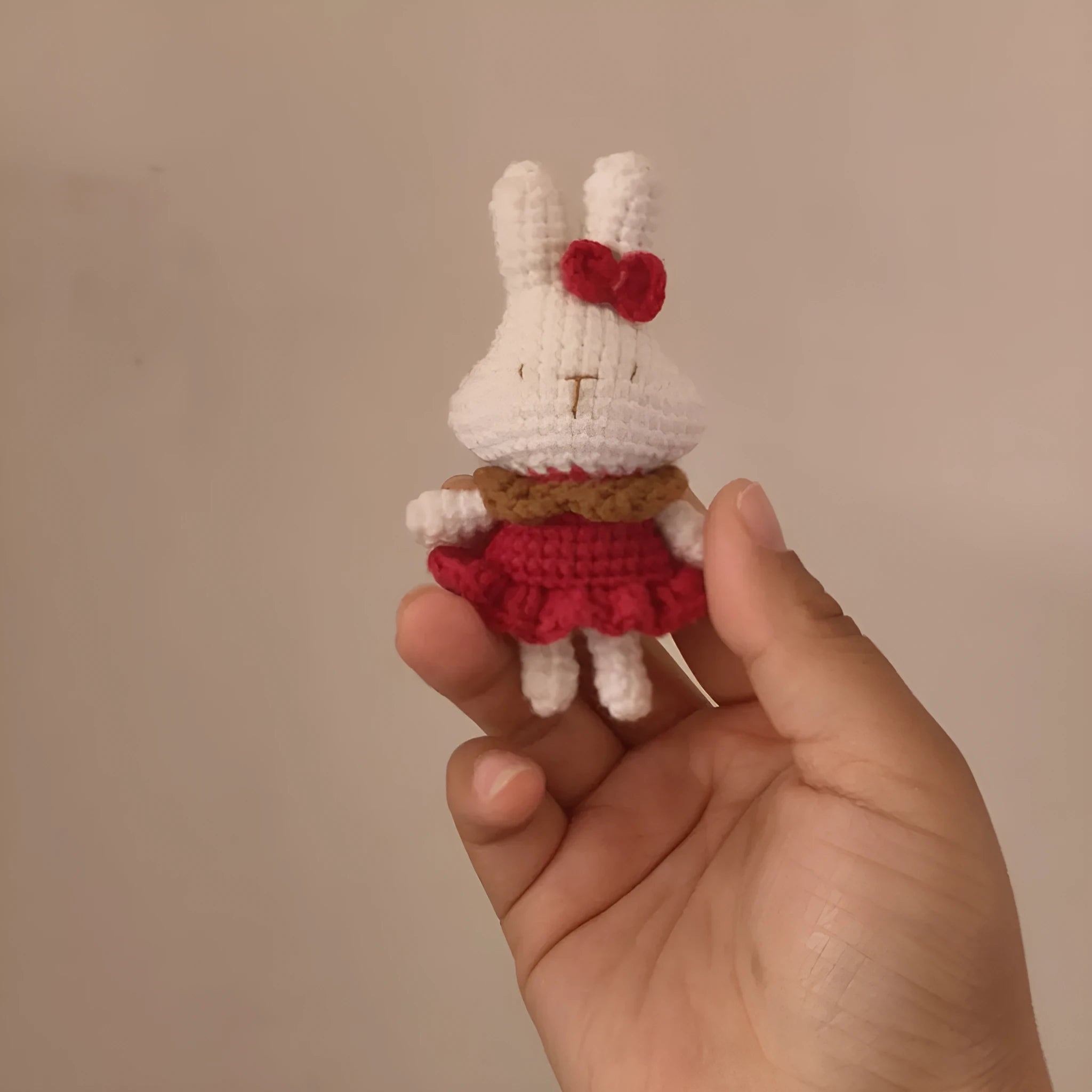 Hand-crocheted wool rabbit pendant accessory with key chain attachment option
