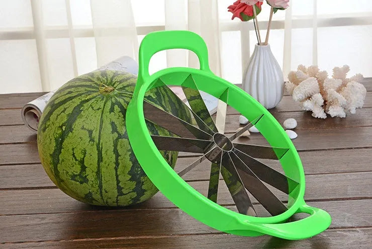Green plastic melon slicer with stainless steel blades cutting a watermelon into wedges.