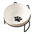 White ceramic cat bowl with cat paw pattern and black iron frame with cat ears