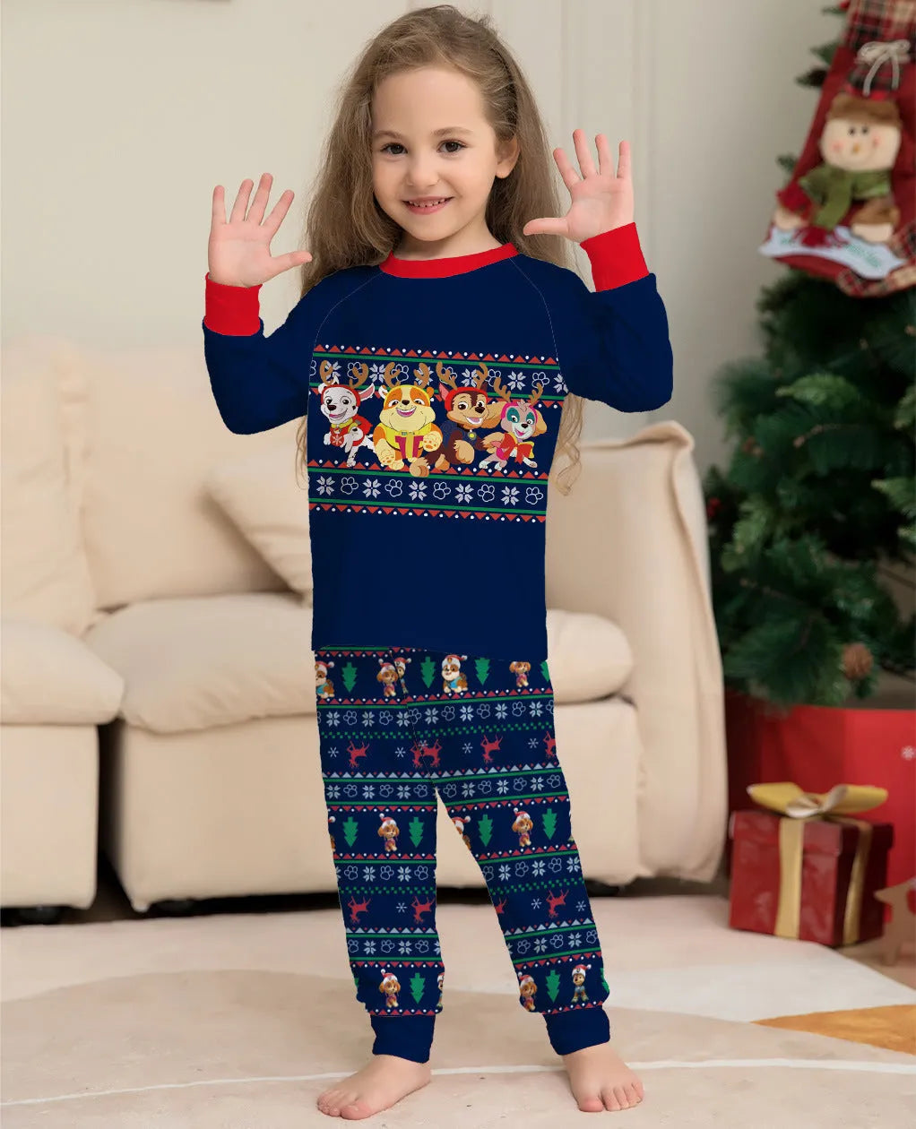 Matching red plaid Christmas pyjamas with deer print for family, including dog, in various sizes.