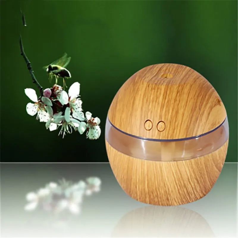 Brown wood grain USB humidifier with 200ml water tank showing adjustable mist control