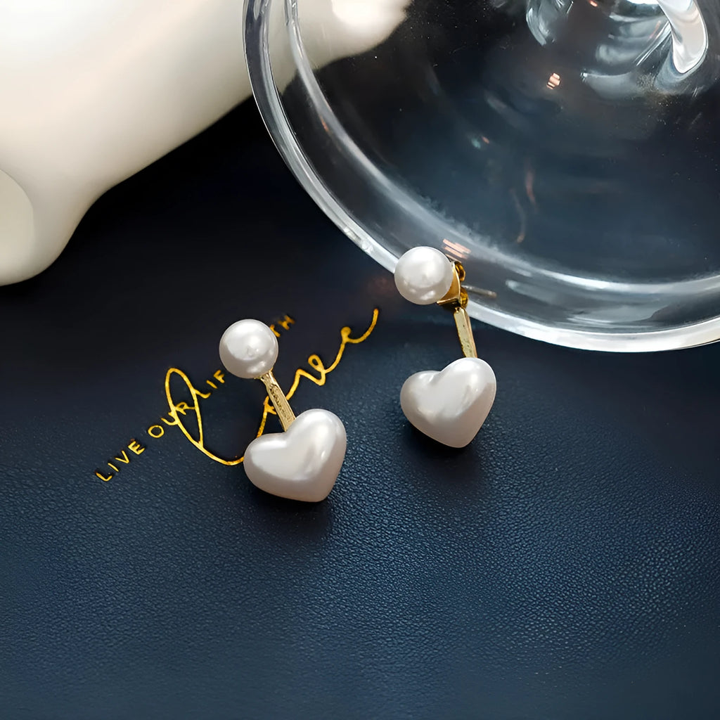 Heart-shaped stud earrings with pearlescent artificial gemstone accents on electroplated alloy