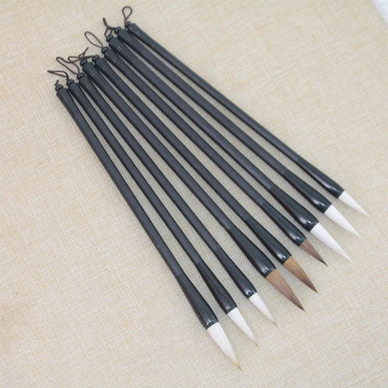 Traditional Chinese student writing brush with Jianhao nib on steel pipe barrel measuring 23cm length