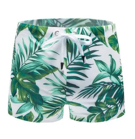 Green nylon men's boxer briefs swimwear shown flat, size L to 3XL available