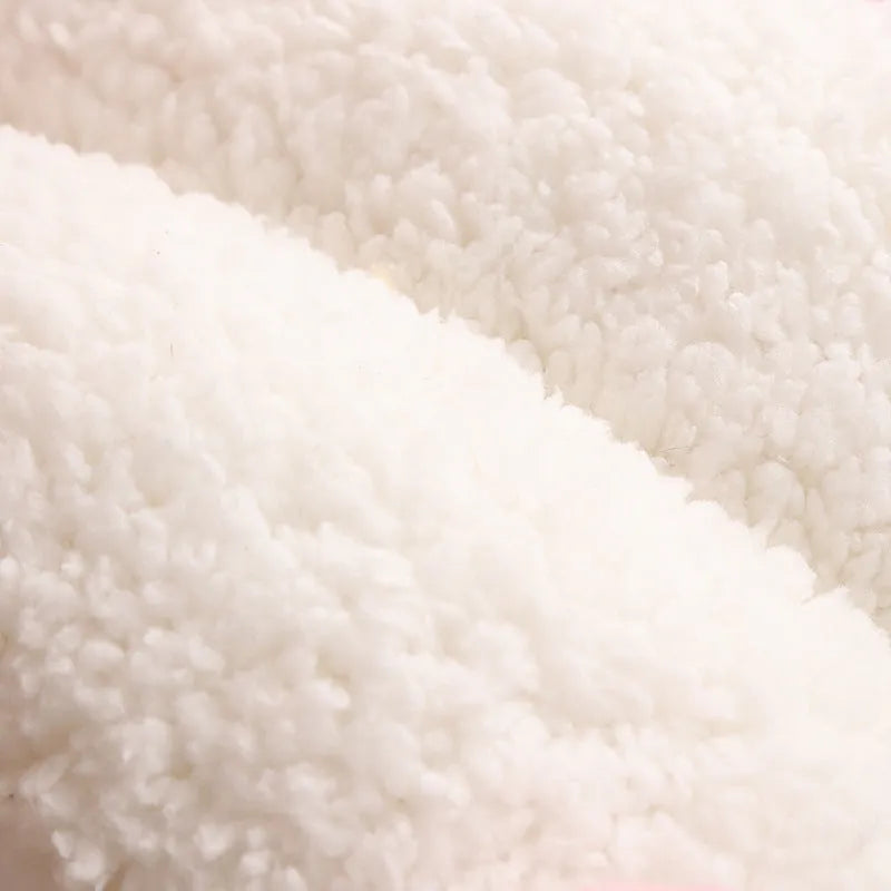 Blue enclosed cat nest with a soft fleece interior and a removable cushion, shown next to a ruler indicating its 40cm by 50cm size.