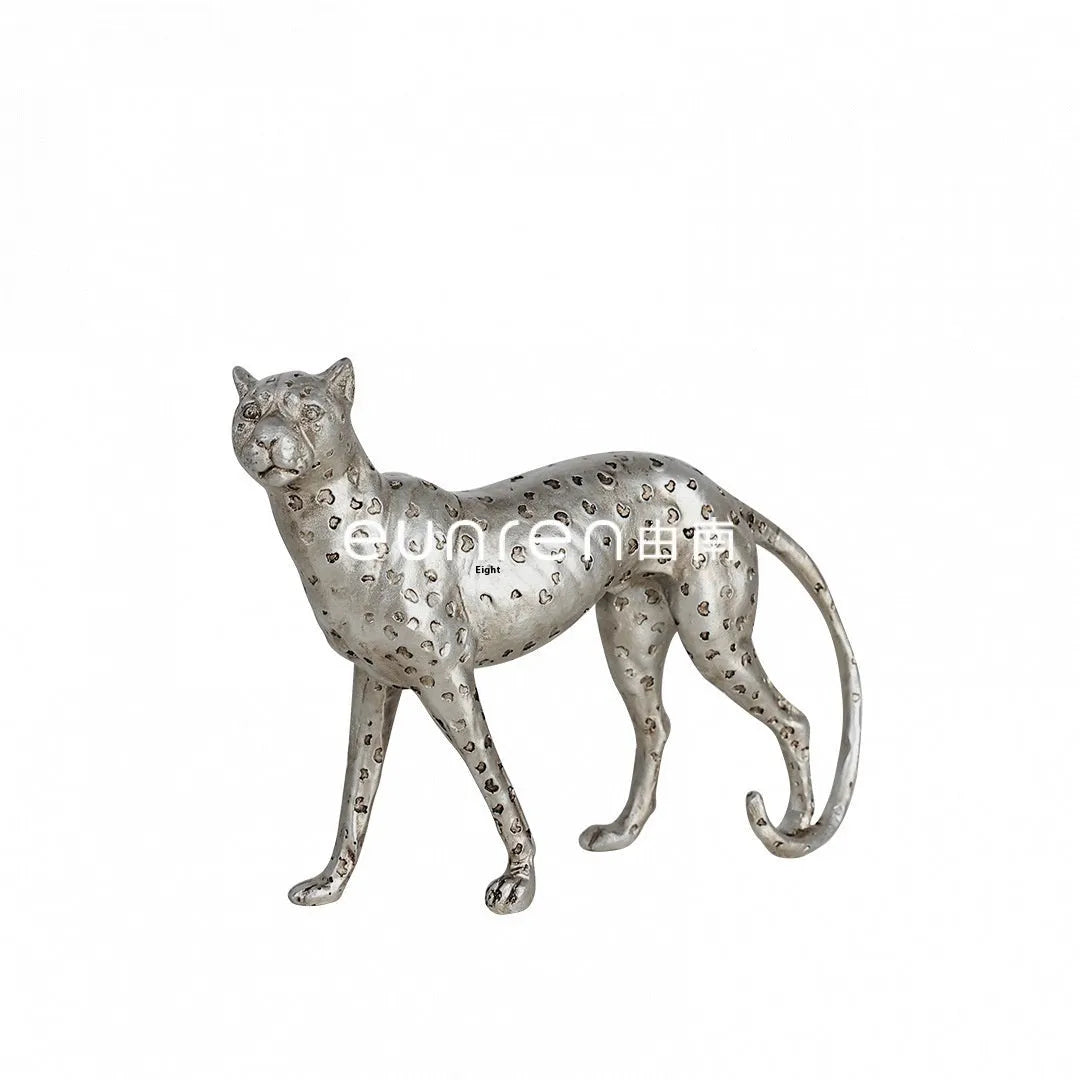 Leopard resin ornament in American Leopard colour on a shelf
