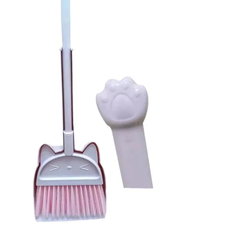 Purple broom and dustpan set with rotating head and brush holder storage