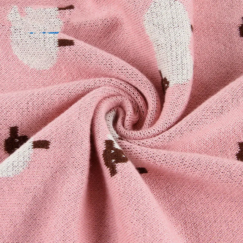 Pink and grey 100% cotton baby sheepskin blanket measuring 100x80cm for cots and prams.