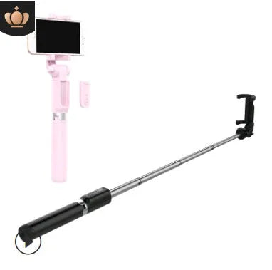 Aluminium alloy Bluetooth selfie stick with remote control and adjustable phone clip next to a smartphone