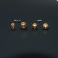 Assortment of brass decorative buckles in antique gold finish showing round foot nail and bucket foot nail designs