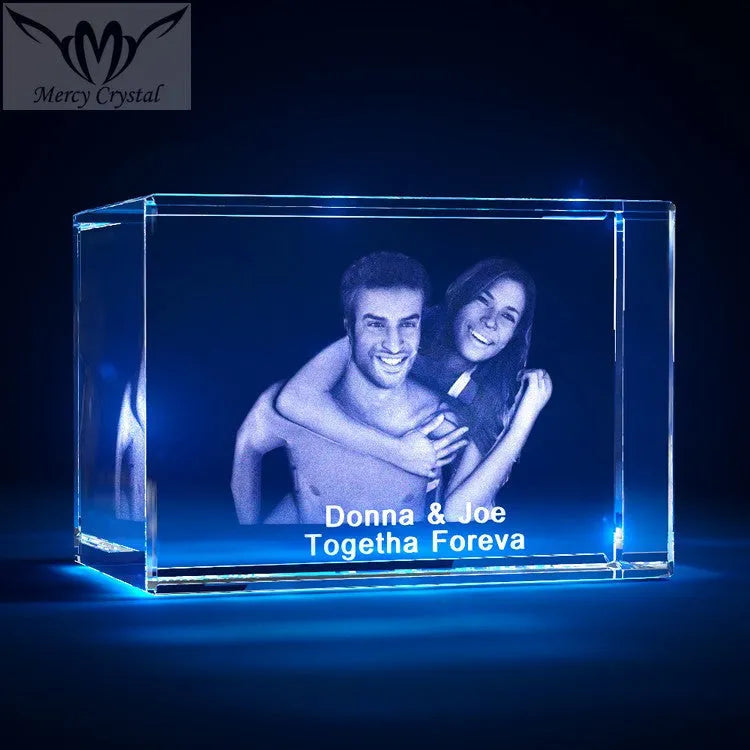Custom laser engraved crystal sphere with personalised photo inside, available in multiple sizes and styles