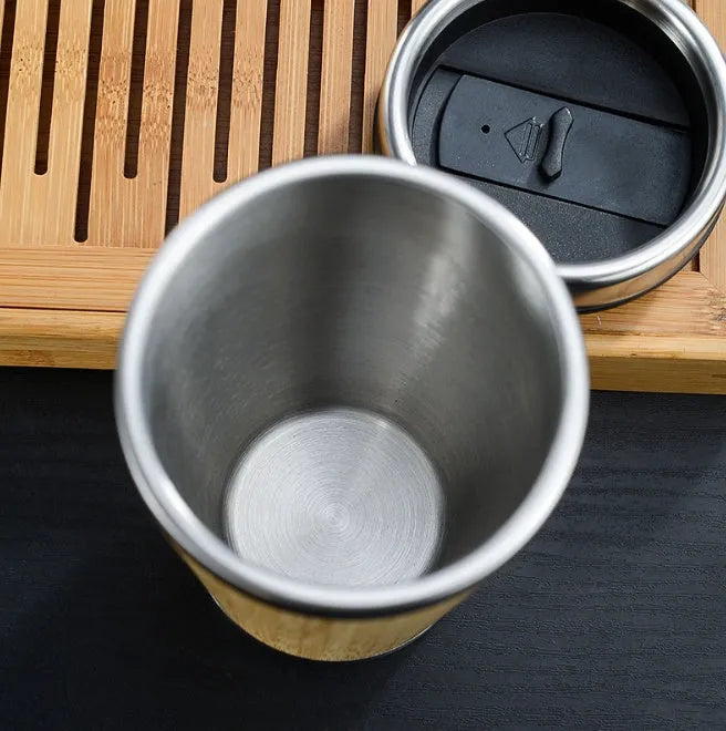 Bamboo coffee cup with stainless steel double wall insulation, 420ml capacity, leak-proof lid and foam pad