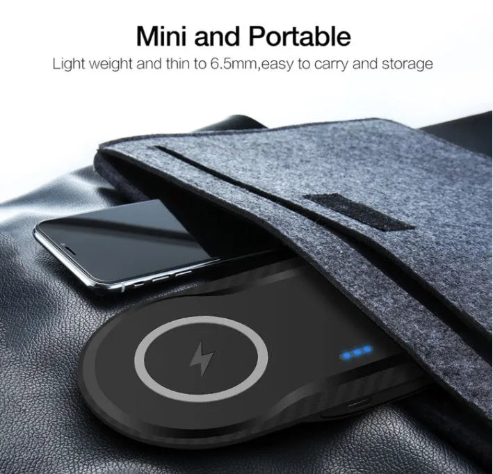 Black and white dual wireless charger showing two phones charging simultaneously on separate pads