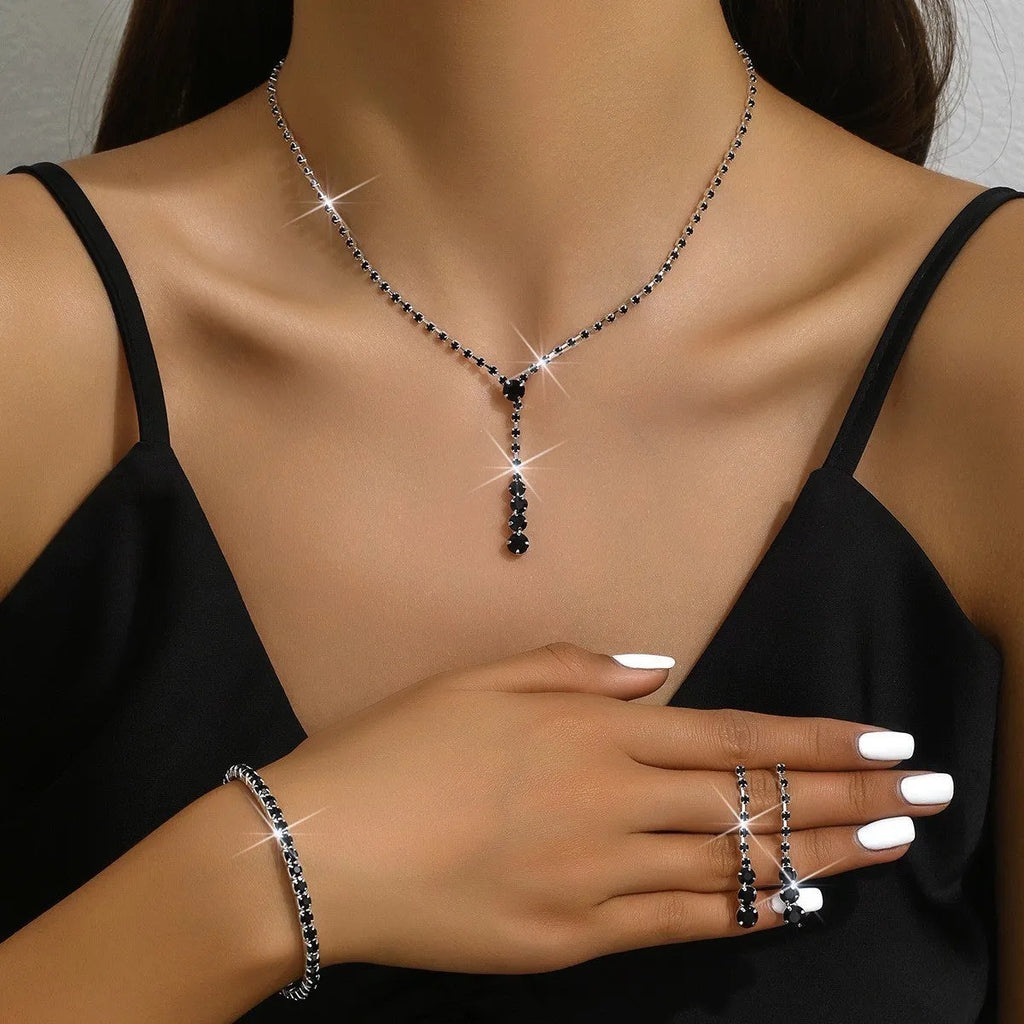 Women's bridal jewellery set with rhinestone heart pendants on snake chain