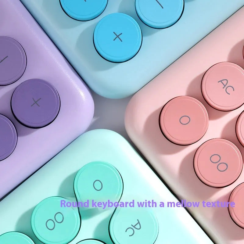 Desktop calculator with colourful gradient design in violet, cherry blossom, blue, and mint green tones